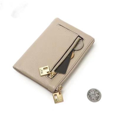 China WalletsLeather Vintage Leather Short Foldable Elegant Women Girls Wallets Waterproof Hot Sale Fashion Bag ID Card Holder Fashion Wallet for sale