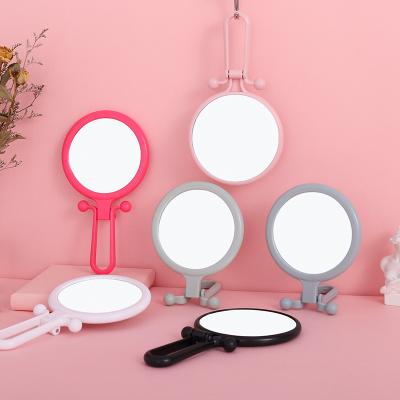 China Custom Magnifying Makeup Dressing Table Mirror Usable Portable Folding Double Sided Hand Held Mirrors Makeup Tools for sale