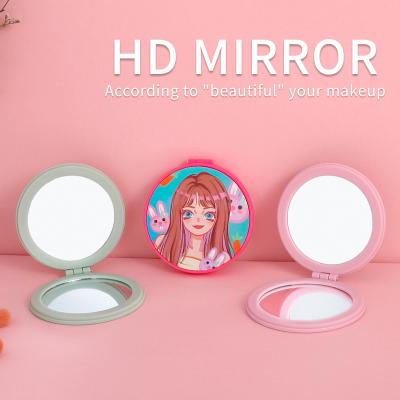 China 2022 New Custom Pattern LOGO Cartoon Handheld Small Round Clamshell Fashion Mini Custom Makeup Mirror for sale