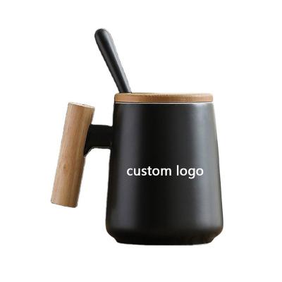 China Viable Matte Black Ceramic Coffee Mug With Wooden Handle for sale