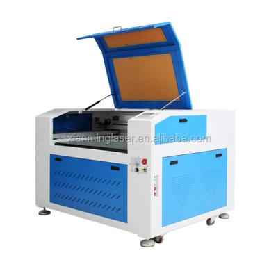 China Laser CUTTING Liaocheng XM 900*600mm workplace laser cutting machine for CNC pipe laser cutting machine for sale