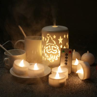 China Youhoda Mini Tealight LED Flameless Plastic Battery Operated Electric Votive Flameless Candles with 10 Key Remote Control Timer for sale