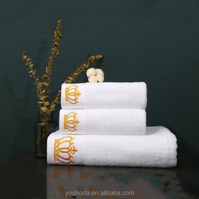 China Custom Embroidery Compressed Or Applied 100% Cotton 500gsm 21s/2 White Face Towel For Hotels for sale