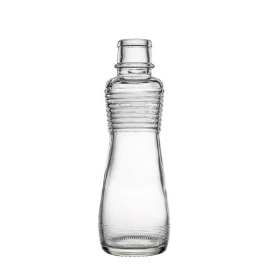 China Food Berlin Packaging Sesame Seed Oil Glass Bottle Customized Capacity Food Grade Clear Glass Round Hot Sauce Bottle for sale