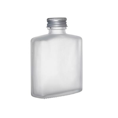 China Berlin Glass Bottle 50ml 100ml 200ml 250ml 500ml Transparent Flat Shoulder Wine Glass Flask Bottle Beverage Flat Hip Flask for sale