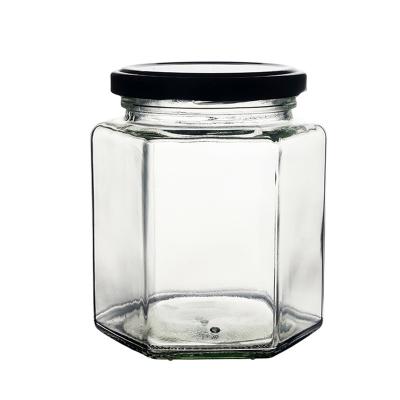 China Food Grade Berlin Packaging Hexagonal Glass Jar 9oz 100ml 190ml Customized Capacity Honey Jam Hexagon Jar Glass for sale