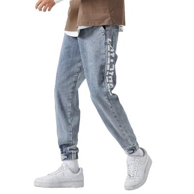 China 2021 YZP Autumn New Men's Trend Letter Print Lace-Up Side Pants Breathable Casual Cropped Jeans Pants for sale