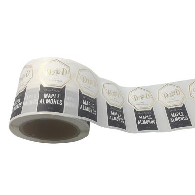 China Custom Adhesive Glossy UV Gold Foil Label Bottle Roll Sticker Hot Stamping Waterproof Stickers Roll Printing for sale