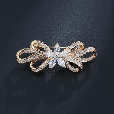 China Wholesale Korean Exquisite Copper Three-dimensional Stain Cubic Zirconia Bow Fashion Soft Accessories Brooch Pin for sale