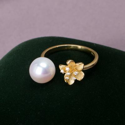 China CLASSIC Flower Shaped Freshwater Pearl Ring S925 Silver Opening Adjustable Ring For Sale for sale