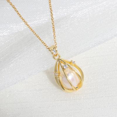 China New Style Cage Shape Drop Pearl CLASSIC Gold Plated Pendant Necklace For Women for sale