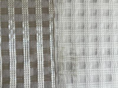 China Polyester/Fiberglas Geogrid nähten zusammengesetzte Geotextilien mit nichtgewebten Geotextilien zu verkaufen