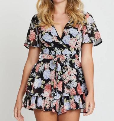 China Breathable Customized Floral Women Jumpsuit Sleeve Waist Tie Short Cause Playsuit for sale