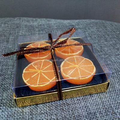 China Fruit scented shaped candles, half orange candles, 4 pcs per pack for sale