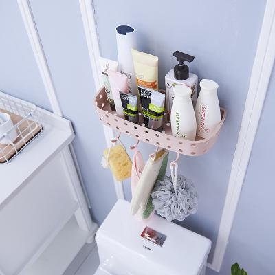 China Sustainable Adhesive Wall Mounted Sundries Storage Plastic Bathroom Kitchen Hanging Shelf for sale