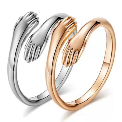 China Vintage CLASSIC Gold Plated Couples Embrace Hand Rings Combine Hands Kissing Opening Rings for sale