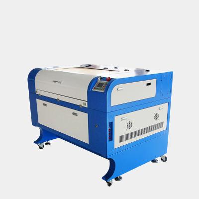 China Laser CUTTING 60w 80w 100w CO2 laser cutting machine used for carving and cutting acrylic wood for sale