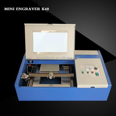 China Laser Engraving Small Home Business Mini Laser Engraver Stamp Making Machine for sale