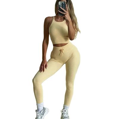 China Breathable 2 Piece Tik tok Women Gym Bra Ladies Fitness Leggings Tights Workout Sports Suit Seamless for sale