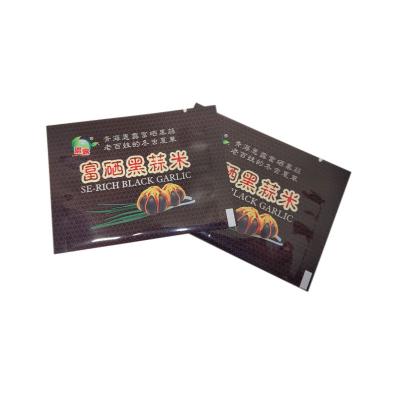 China Custom Packaging Pouch Gold Aluminum Foil Barrier Printing Honey Sachet 3 Sides Sealed for sale