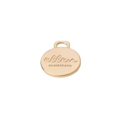 China Sustainable Metal Labels And Tags For Handbags Engraved Metal Logo Bag Accessories Metal Label for sale