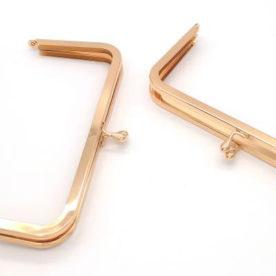 China Eco-friendly Shiny Gold Bag Handles Metal Frame Clutch Bag Closure Hardware Kiss Lock Frames For Handbag for sale