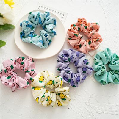 China Factory wholesale new fashionable design soft elastic scrunchies hair tie for women ponytail holder carrot design laser hair scrunchies for sale