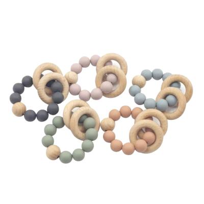 China Toy Hot Sale Soft Elephant Crochet Teething Wooden Teether Ring Baby Silicone Teether Sensory Toys for sale