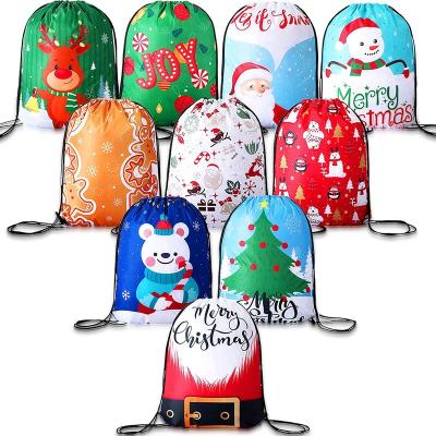 China Present Fashion Christmas Drawstring Bags Large Stocking Bags Santa Goodie Backpack Party Treat Bag For Christmas Party Decoration for sale