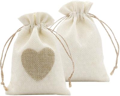 China Small Fashion Bag Heart Shaped Raw Canvas Drawstring Gift Canvas Bag Suitable for Wedding Party Christmas Thanksgiving and Valentine's Day for sale