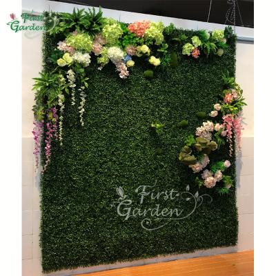 China Eco-friendly artificial green grass fack simulation plants rose hydrangea vine leave decoration wall panel backdrop customized for sale