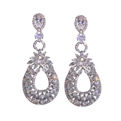 China Magnetic bridal earrings wedding European and American fashion trends new summer hot rhinestone earrings wholesale wedding earrings for sale