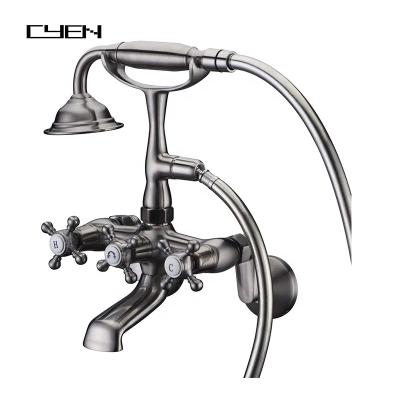 China CYEN Floor Stand Faucets Swept Tub Filler Luxury Nickel Bathroom Phone Shape Shower System Wall Mounted Bathtub Faucet With Hand Held Shower for sale