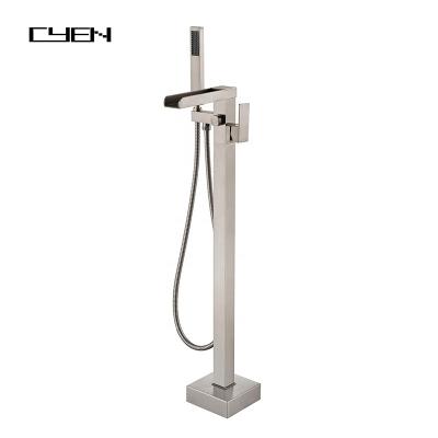 China Barless CYEN Swept Nickel Waterfall Single Handle Floor Mounted Faucets Freestanding Tub Faucet With Handheld Shower for sale