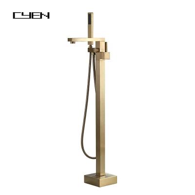 China Sliding Bar CYEN Single Handle Lead Free Solid Brass Floor Mounted Bath Filler Brushed Gold Freestanding Tub Faucet With Hand Shower for sale