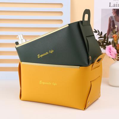 China Nordic Viable Daily Goods Leather Storage Box Jewelry Cosmetics Storage Tray Table Folding Storage Box for sale