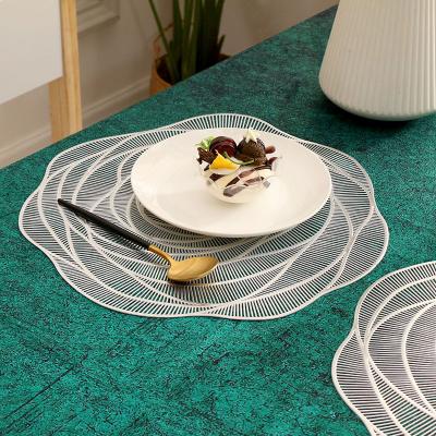 China Oil Proof Non-Slip Dining Place Mats Hollowed-out by Rose Shape Table Mat Viable Carpets for sale