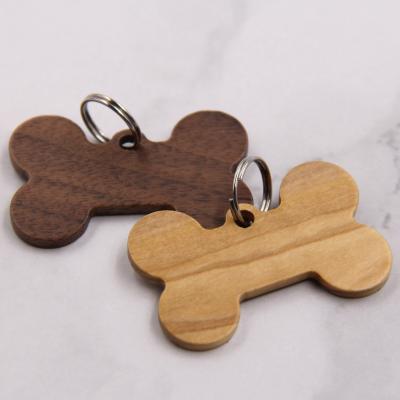 China Small Animals Hide Wooden Crafts Wooden Dog Tag For Pet Collar Pet Name Tag Bone Shape Dog Name Tag for sale