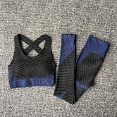 China Fitness and Yoga Wear Vest Solid Color Elastic Seamless Sportswear Suit Breathable Two Piece Women Yoga Sets for sale