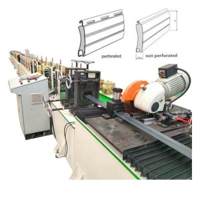 China Factory 42/55/77 PU Foam Roller Shutter Door Machine PU Foam Roller Shutter Slat Roll Forming Machine With Fast Speed for sale