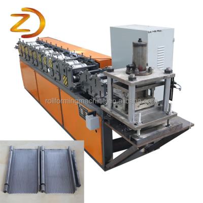 China Steel shutter door color slat roller shutter door roll former/rolling slat forming machine for sale