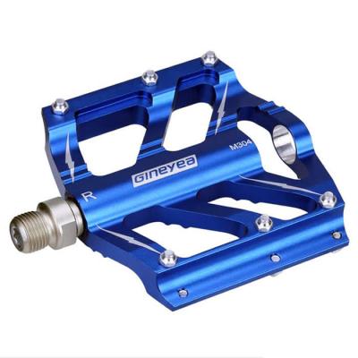 China Bicicleta Pedal de aleación de aluminio procesado por CNC Gran forma plana Ligero Pedal de rodamiento sellado en venta