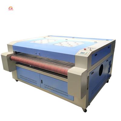 China Laser Engraving CNC Apparel CO2 Laser Cutting Machine Cloth Cutting Laser 1610 With Auto Feeding System for sale