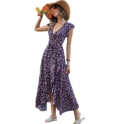 China Stocklot Breathable Women's Beach Dress Floral Print Rayon Bohemian Dress With Symmetrical Chic Skirt In Stock for sale