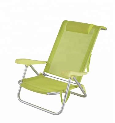 China Easy-carry beach chair with footrest small sea aluminum foldable deck chair with armrests and aluminum frame ideal for pool garden for sale