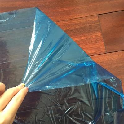 China Wholesale Dustless Self Adhesive Hard Floor Protective Film Protection Roll Pe Surface Wood Floor Protection Film zu verkaufen