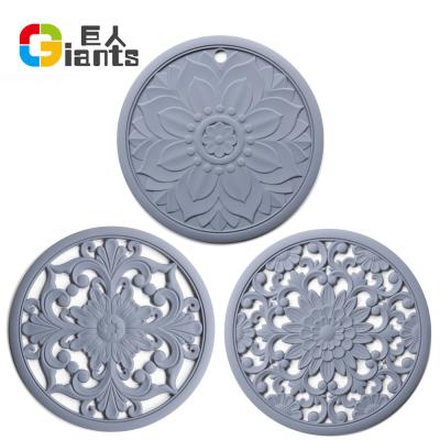 China Sustainable Multi-Use Intricately Carved Hot Pot Tripods For Hot Dishes, Kitchen Mats, Table Mats for sale