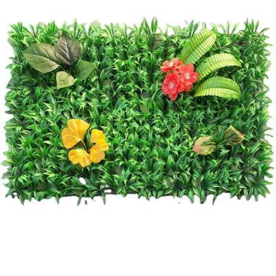 China Lawn Plant Decoration Simulated Wall Plastic Fake Flowers and Grass Background Wall Partition Window Indoor Decoration for sale