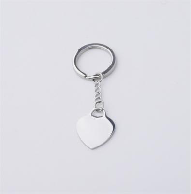 China Shiny Engraving Metal Pendant Customized Mirror Stainless Steel Key Love Chain for sale