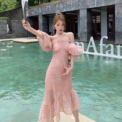 China 2022 new spring women's clothing fashion temperament wave point suspender dress niche beach skirt wholesale French women anti-static for sale